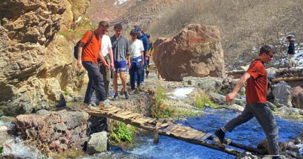 Group of tourists during a hike in Atlas Mountains